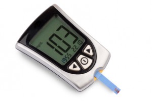 Glucometer isolated against a white background showing a good result