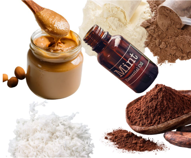 A collage of ingredients: a jar of nut butter with a wooden spoon, coconut flakes, cocoa powder in a bowl, mint essential oil, and piles of brown and white powdered ingredients.